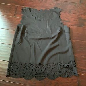 Black laser cut tank top, size small.